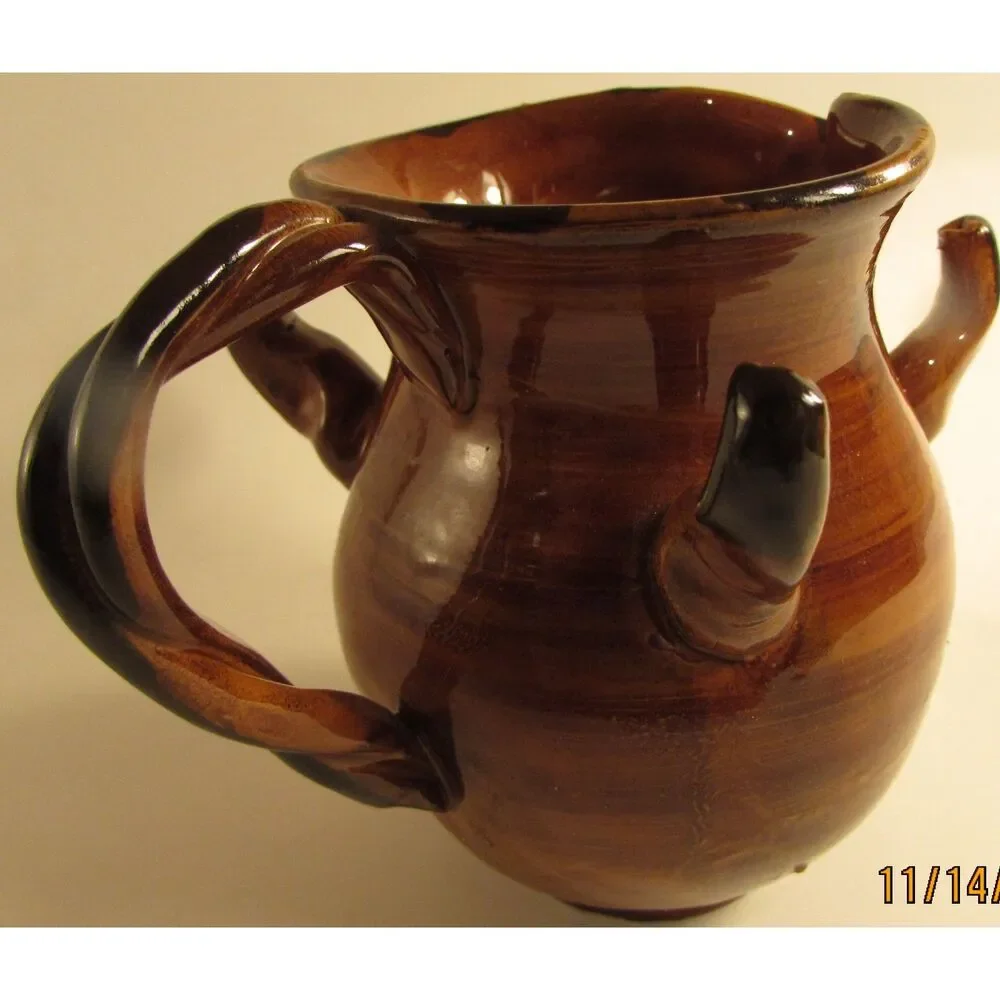 Studio Pottery Creamer brown glazed with flowers artist signed braided handle
